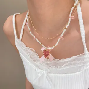 French vintage style double-layer pearl necklace with heart pendant and pink bow ribbon