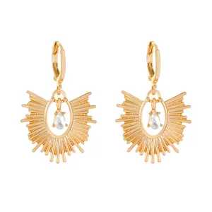 Golden sunburst leverback earrings with pear-shaped crystal and vintage metal texture
