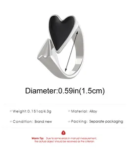 Detail view of silver heart ring specifications including alloy material and 1.5cm diameter