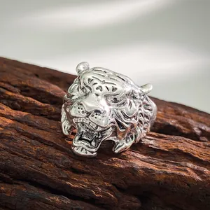 Detailed close-up of a vintage silver tiger head ring with realistic 3D fur textures