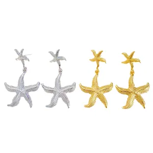 Double-layered starfish drop earrings in gold and silver for summer beach vacation style