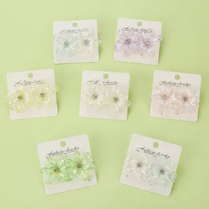Set of 7 pairs colorful Y2K iris flower stud earrings in resin with small center diamond