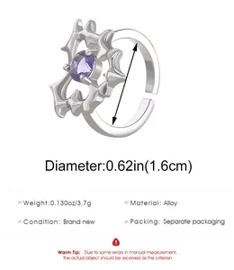 Detail view of gothic thorn ring with purple gemstone and size specifications info