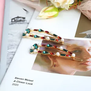 Elegant gold hair clip set with vintage red and green crystals and white pearls