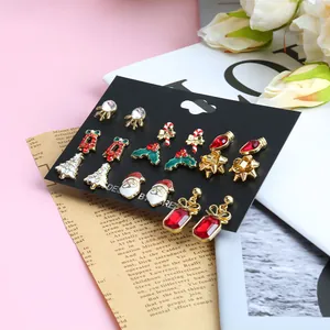 Christmas stud earring set with Santa Claus and reindeer designs in festive holiday colors