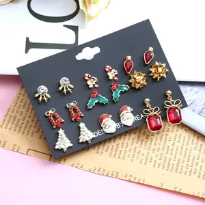 9 pairs of festive Christmas stud earrings featuring Santa, reindeer, and trees in alloy