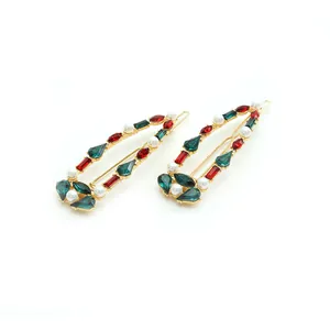 Sparkling crystal hair clips with red and green stones and pearls on gold metal base
