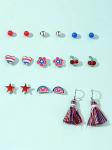 Flat lay detail of Independence Day earring set with red white blue tassels and studs