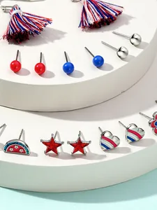 Detail of USA Independence Day earring set with red white and blue tassels and studs