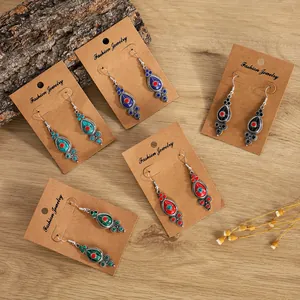 Set of five bohemian teardrop earrings in vintage silver with colorful resin inlays