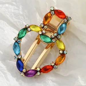 Regenboog kristallen hart haarklem met kleurrijke strass-steentjes op gouden metaal