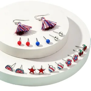 Patriotic earring set with red white and blue tassels and festive charms for Independence Day