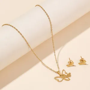 Minimalist gold butterfly jewelry set including necklace and stud earrings for women