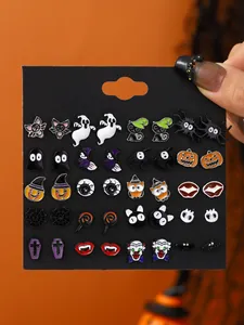 Dettaglio di 20 paia di orecchini di Halloween con zucche, fantasmi e teschi
