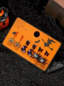 Detailed view of Halloween stud earring set with pumpkin, ghost, and spider motifs
