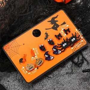 8-pair Halloween stud earring set featuring pumpkin skull and witch icons on orange card