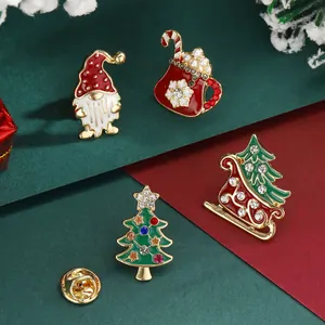 Set of four festive Christmas brooches with rhinestones and colorful holiday designs