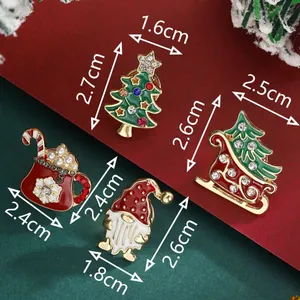 Set of 4 festive Christmas tree and sleigh brooches with enamel and rhinestones