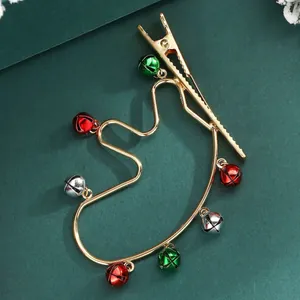 Christmas reindeer antler hair clip with colorful bells on green card background