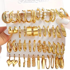 Set of 24 pairs of vintage gold geometric earrings with pearls and heart charms
