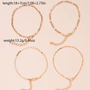 Detail view of four-piece gold chain bracelet set with 18cm length and lobster clasp
