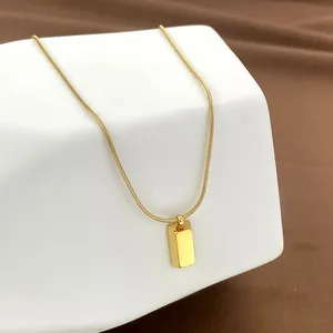 Minimalist gold square block pendant necklace with a sleek snake chain for women