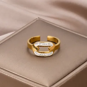 18K gold plated chain link ring with sparkling micro-pave crystals on satin background