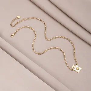 Golden titanium steel necklace with shell perfume bottle pendant and sun flower relief