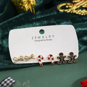 Set de pendientes navideños con bastones de caramelo, hombres de jengibre y lazos
