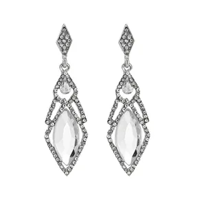 Detailed macro of silver teardrop tassel earrings with sparkling marquise crystal stones