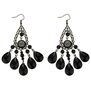 Detailed view of vintage black gemstone waterdrop tassel earrings with bronze filigree base