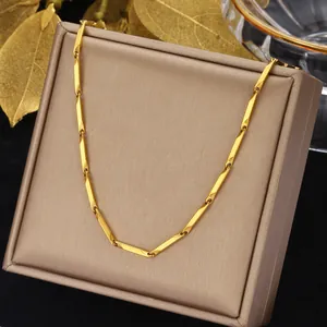 Collana a catena in acciaio al titanio dorato a forma di bambù su scatola porta gioie