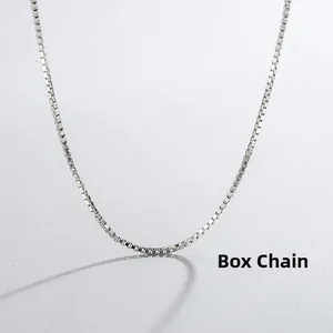 Detailed view of polished silver stainless steel box chain with interlocking links