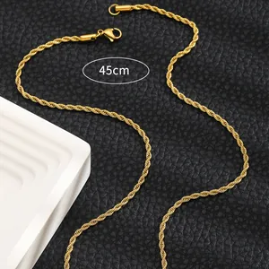 Detail of 45cm golden titanium rope chain with lobster clasp on black leather background