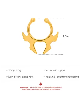 Macro view of gold batwing-style non-piercing copper septum ring with 1.8cm height