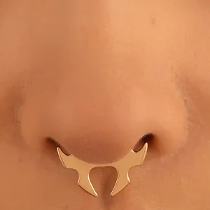 Rose gold faux septum ring with vintage ox horn design and polished metal finish