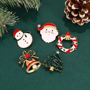 Lot de broches de Noël avec Père Noël, bonhomme de neige, couronne, cloche et sapin