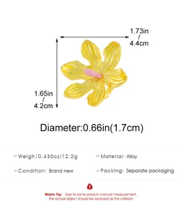 Macro view of yellow flower alloy pin showing 4.4x4.2cm dimensions and 12.2g weight details