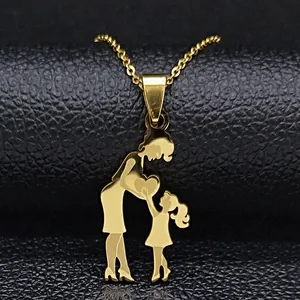 Gold mother and daughter silhouette pendant necklace with heart on black leather background