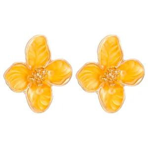 Vibrant yellow matte flower stud earrings with golden floral center and petal details