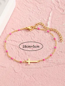 Detailansicht Gold Kreuz Armband mit rosa Perlen und 18+5cm verstellbarer Kette