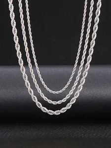 Close-up of silver stainless steel rope chains in three different thicknesses