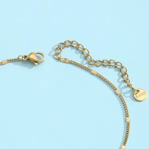 Bracelet de cheville minimaliste en acier inoxydable doré avec disques et fermoir mousqueton