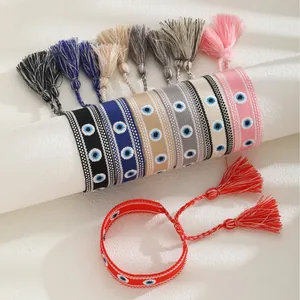 Handmade Evil Eye woven bracelet set with colorful embroidery and decorative tassels