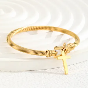 18K gold plated stainless steel C-shaped open cuff with cross pendant and rope texture