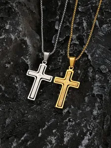 Detalle de collares de cruz de oro y plata con el Padre Nuestro grabado en piedra negra