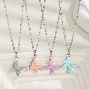 Pastel butterfly pendant necklaces in four colors with delicate silver link chains