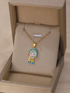 Golden necklace with colorful cartoon character pendant inside a luxury jewelry box