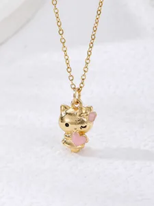 Detailed close-up of golden necklace featuring a cute cat pendant with pink heart and bow