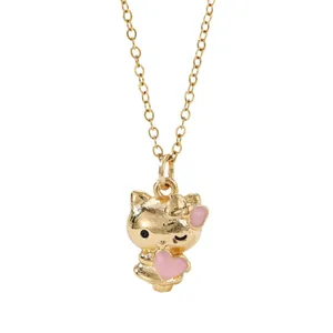Golden Hello Kitty pendant necklace with pink heart and bow on white background